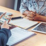 How Debt Settlement Companies Assist in Multi-Loan Negotiations