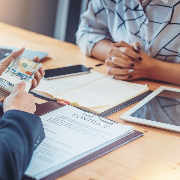 How Debt Settlement Companies Assist in Multi-Loan Negotiations
